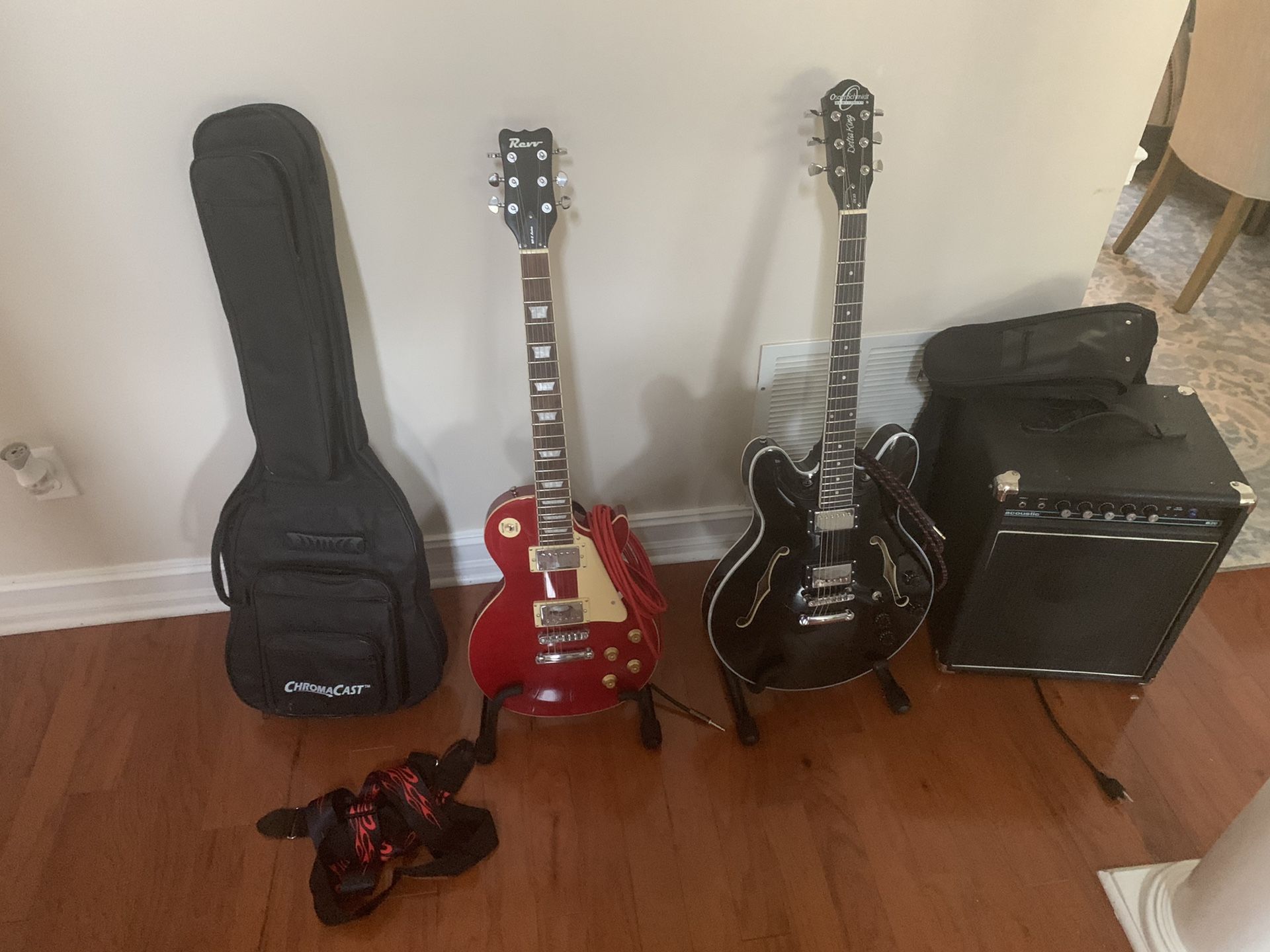 2 guitar 1 new Washburn and 1 new Rew, also a new acoustic amp and 2 guitar stands, with a gig bag. brand new I tried to learn how to play and couldn