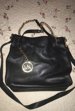 Authentic leather mk cross body bag in good condition