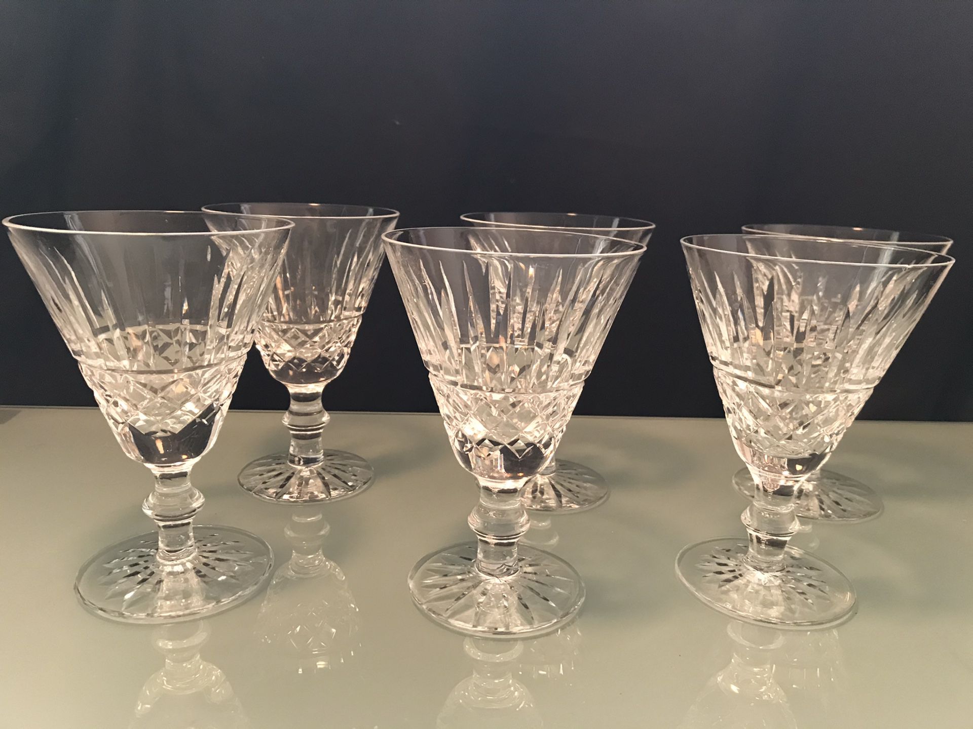 Waterford crystal wine glasses. Set of 6. One glass has tiny little chip. Other than that the glasses are in good condition.