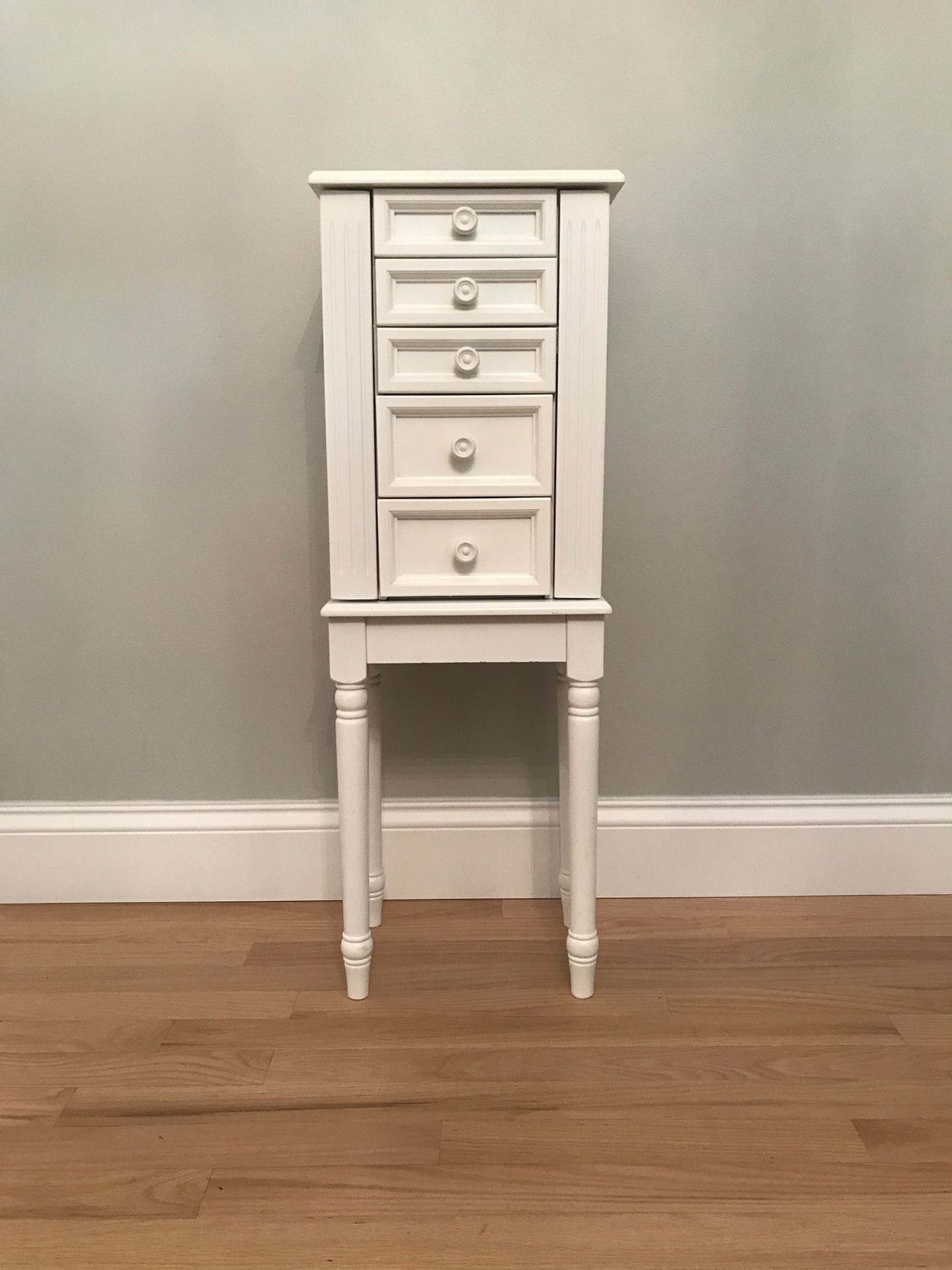 White and pink jewelry armoire