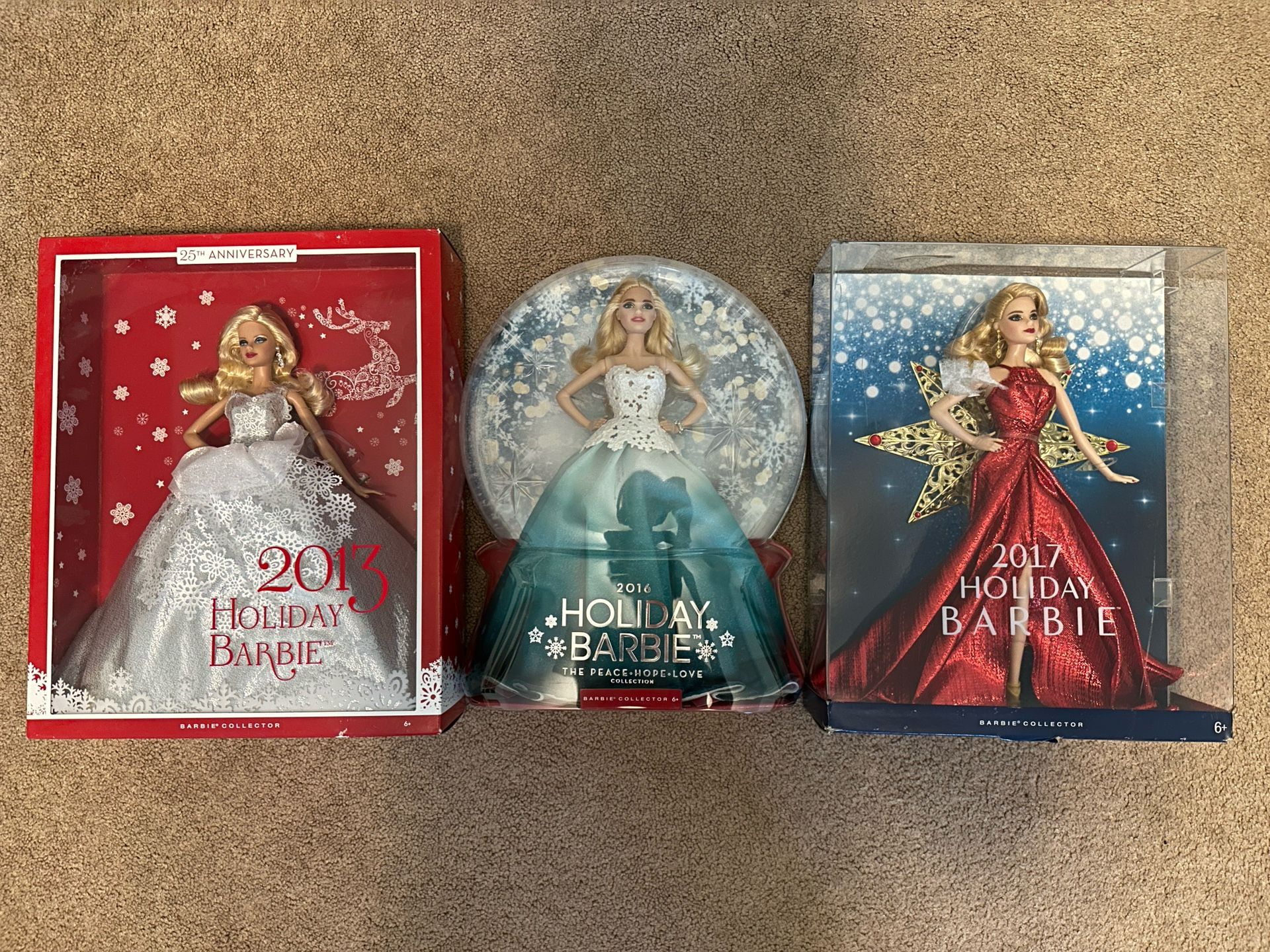 NEVER OPENED Holiday Barbies
