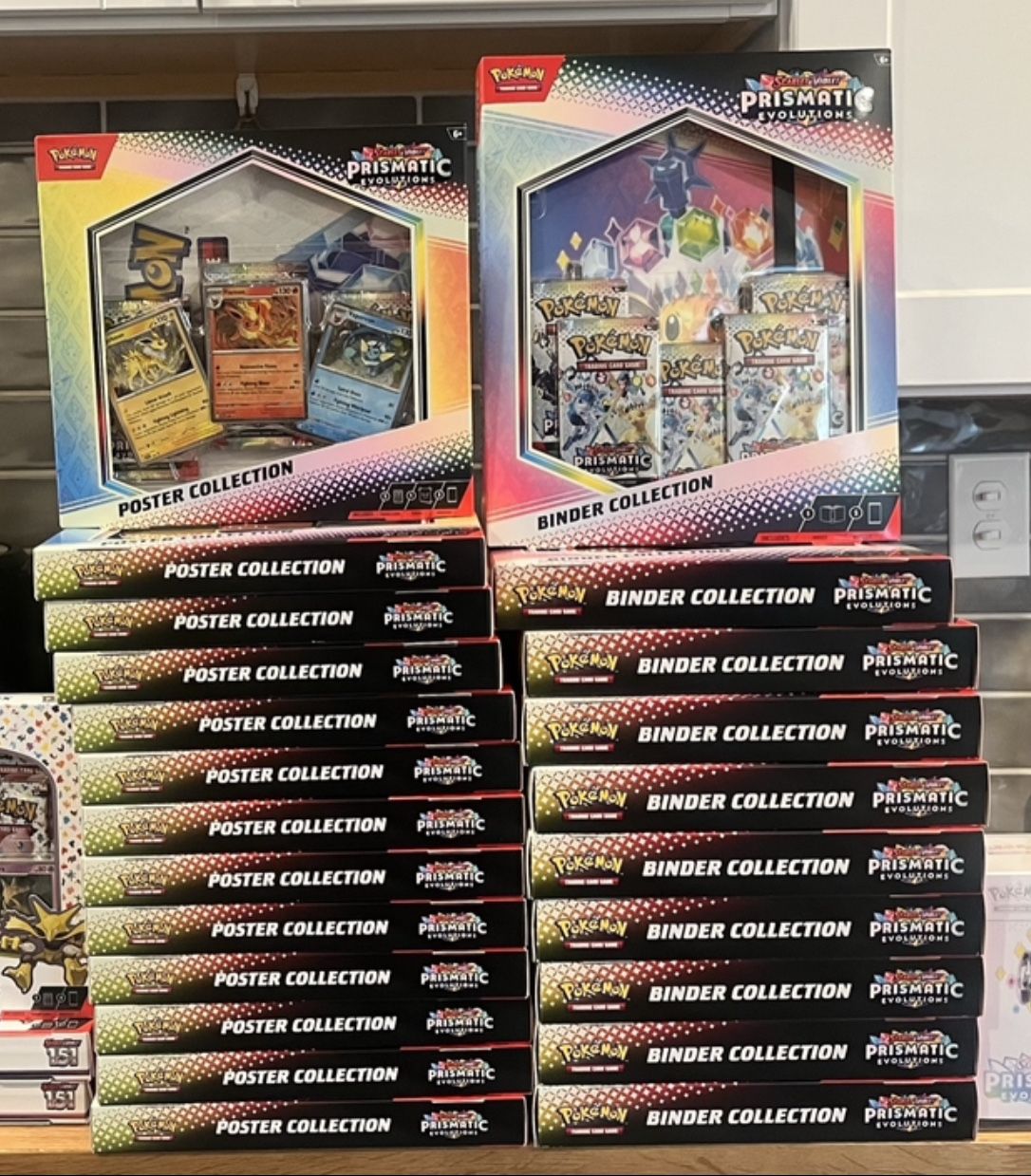 Pokemon Prismatic Evolutions Binders + Posters