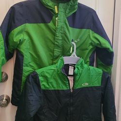 Champion C9 coat 3 in 1 boys medium 8 to 10, med weight, green + blue jacket, full zipper, 3 pockets. The zip in liner is another jacket w/ soft fleec