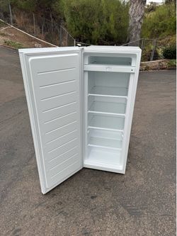 Household tall upright freezer (delivery available)
