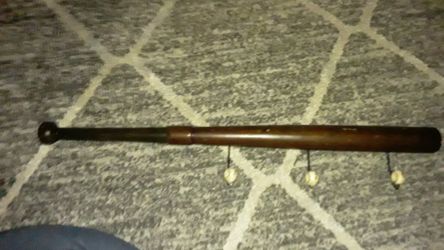 Baseball bat hat rack