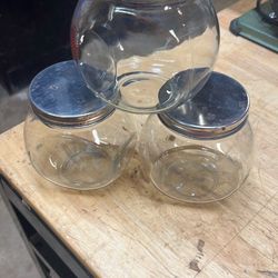 Three vintage candy jars