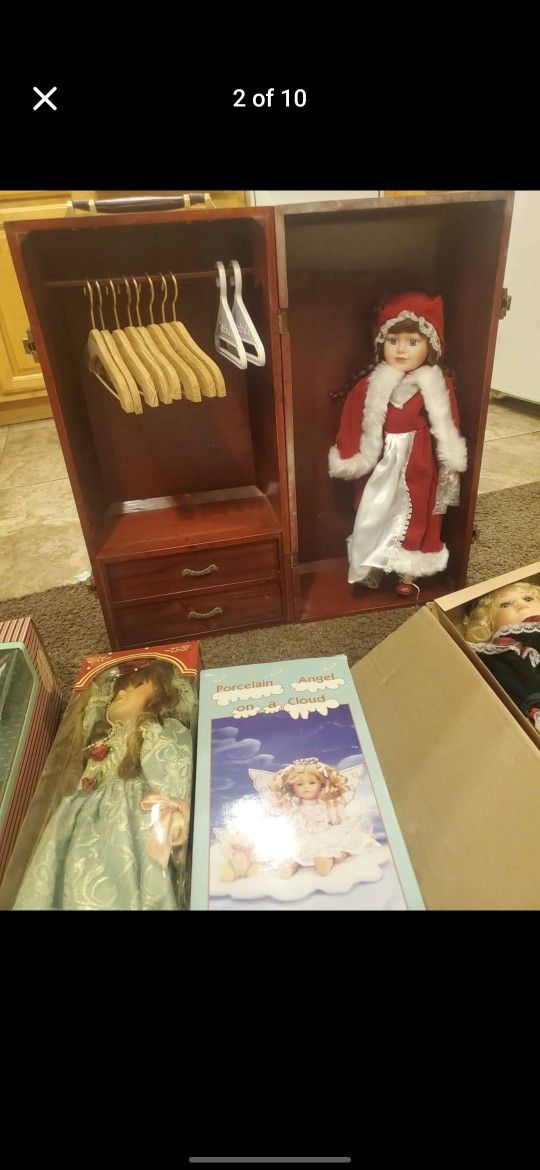 Lot of antique porcelain dolls with mini wooden closet