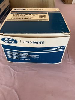 Ford OEM variable valve timing camshaft phaser sprocket AT4Z-6C526-B