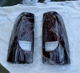 03-06 Chevy Silverado Smoke Red Tail lights