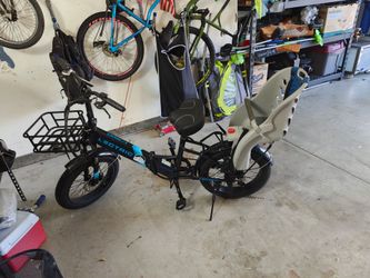 Lectric XP 2.0 Step Thru black ebike with custom toddler bicycle seat included