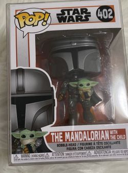Mandalorian Funko with baby Grogu