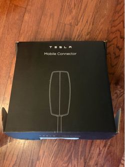 Tesla charger - like new