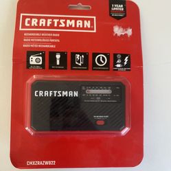 Craftsman emergency weather radio featuring integrated solar charging, a hand crank, flashlight