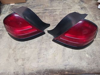 Pair of Red Tail Lights with Black Housing