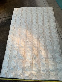 White textured rug
