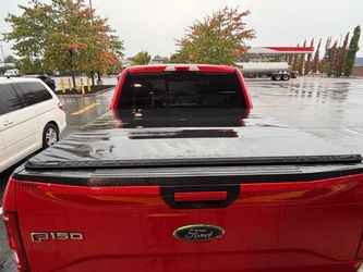Folding gator truck bed cover.