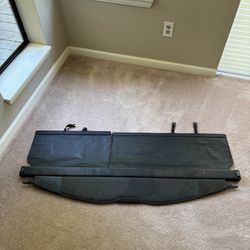 2013 Mini Cooper Trunk  ShadeCover( It has buckles attached to it)