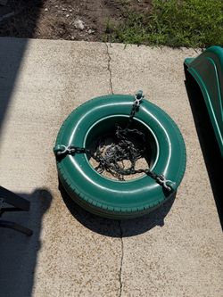 Used plastic tire swing and all hardware in good condition