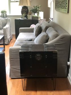 Trunk on hairpin legs. End/ side or small entry table