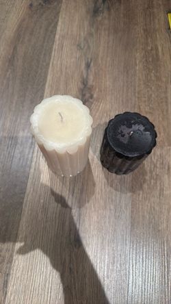 Scalloped wax white and black decorative candles