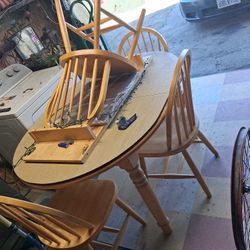 Dining Rm Table Has Four Chairs And Also And Exstensoon To Make Table Bigger Real Gd Condition