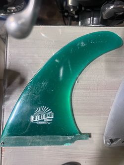 Assorted shortboard and longboard fins