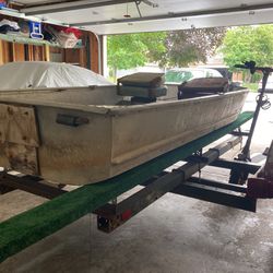 Fishing boat 15’ With Trolling Motor/battery Box and A trailer 17 ft.