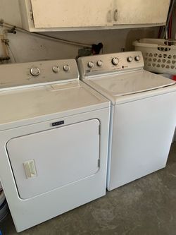 White Maytag Centennial top-load washer and electric dryer