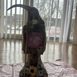 Santa Muerte Covered In Money 