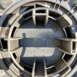 Used Bmw center caps, 6 1/2 inch diameter, set of two. 10.025