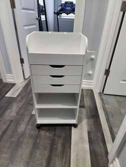 Gift wrapping cart