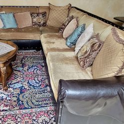 Leather and cloth sectional sofa with pillows, Coffee And Side Tables