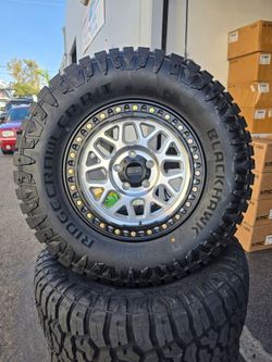 (5) 17" KMC rims w/ 33" Tires Jeep