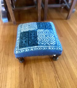Walnut Finish and hand woven upholstery is new