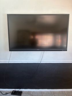 60 inch flatscreen TV with Amazon fire stick
