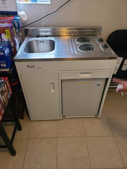 Compact Kitchen With Electric Stove Top
