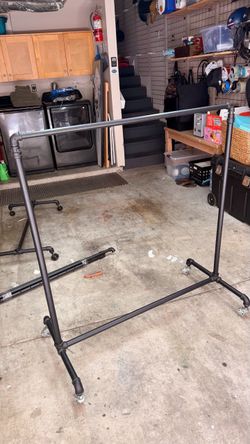 Rolling adjustable garment racks