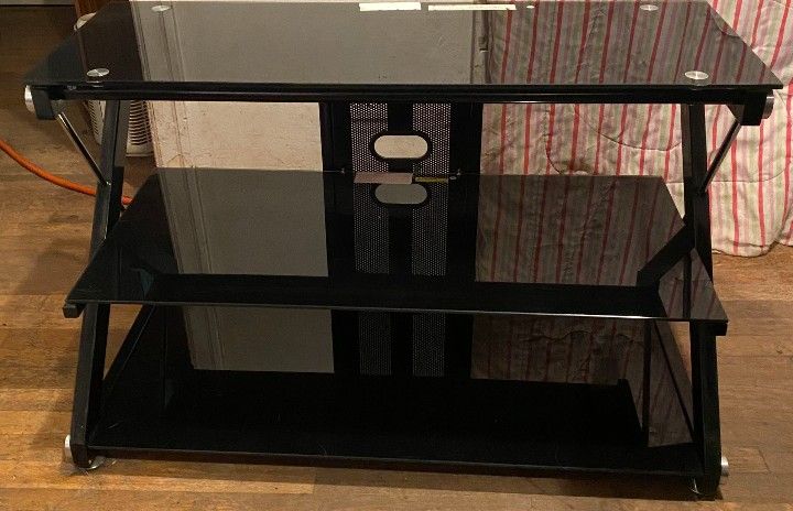 jet black glass and steel tv console