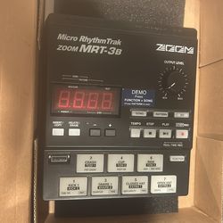 Zoom MRT-3B Micro RhythmTrak drum machine.