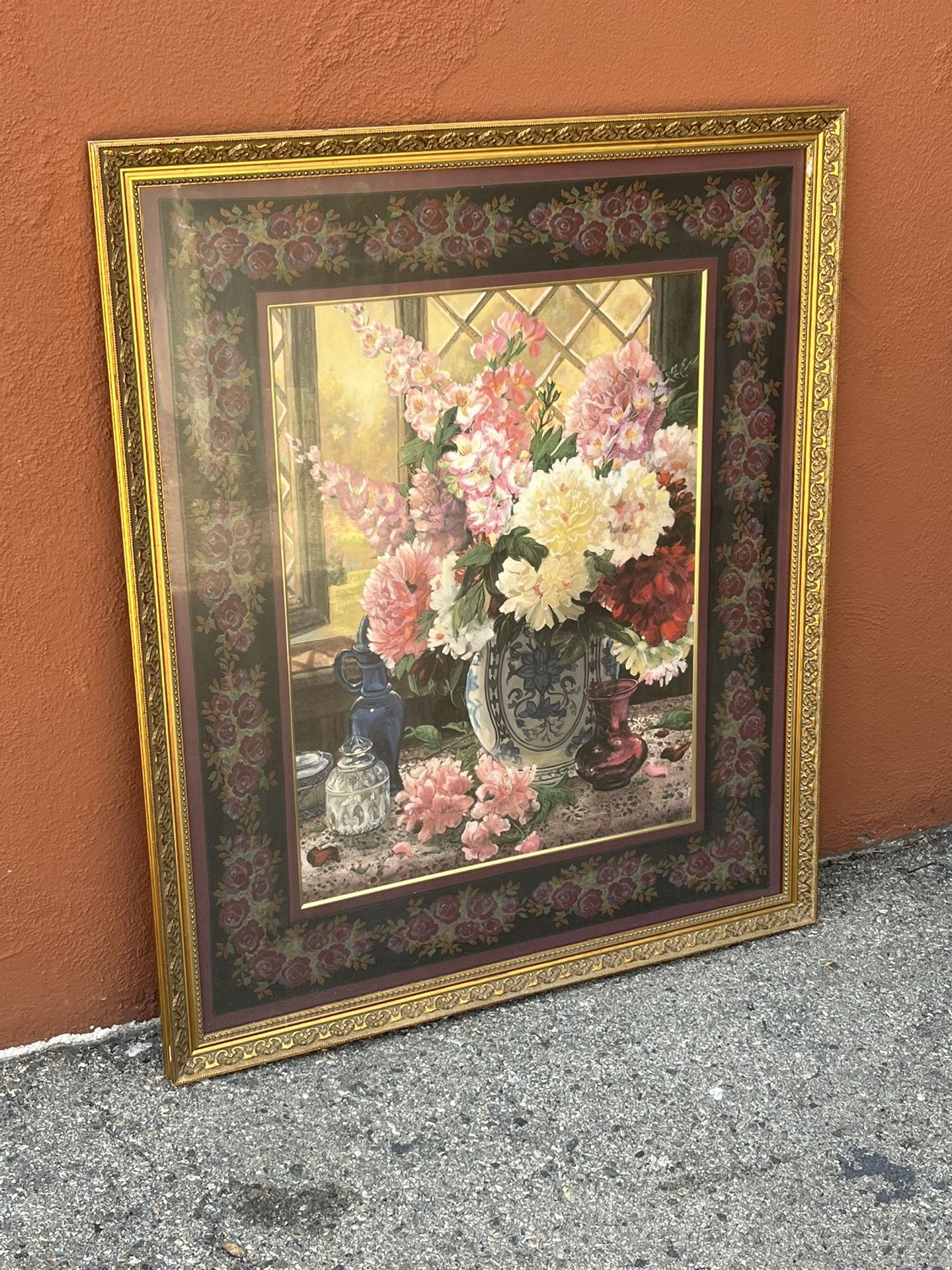 Large gold frame with print flowers