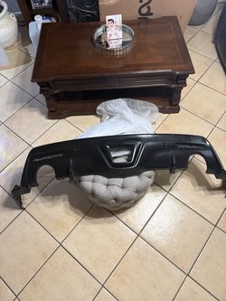 Supra rear bumper lower valence diffuser