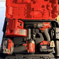 Like new Milwaukee M18 FUEL 18V Lithium-Ion Brushless Cordless Hammer Drill and Impact Driver Combo Kit (2-Tool) with 2 Batteries