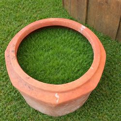 Heavy extra large hexagon Terracotta/ iron planter, perfect for garden use.