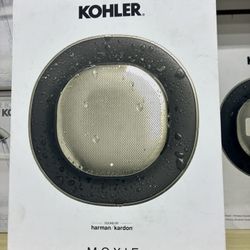 Kohler Moxie showerhead with a detachable, waterproof Harman Kardon wireless Bluetooth speaker