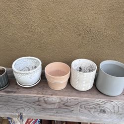 Plant Pots Of Various Colors And Sizes