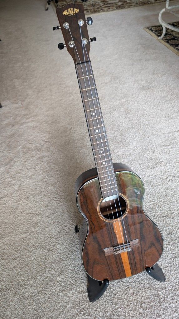 A MINT Kala Baritone Ukulele