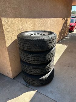FIRM ON PRICE New Rims and tires for GMC Chevrolet Size 250/70 R17 used for only 100 miles