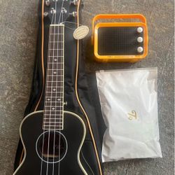 Electric Ukulele w/ Accessories (Case, mini-amp, strings, ect..)