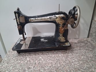 ANTIQUE SEWING MACHINE