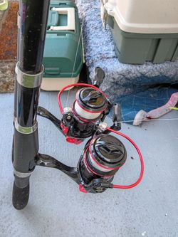 Two poles three Bay buckets two tackle boxes with one fully equipped